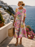 Sofia | Elegante abito midi floreale arioso